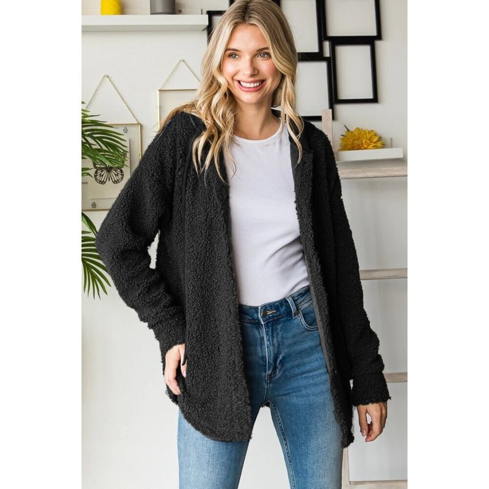 A faux fur shacket with hood in Black